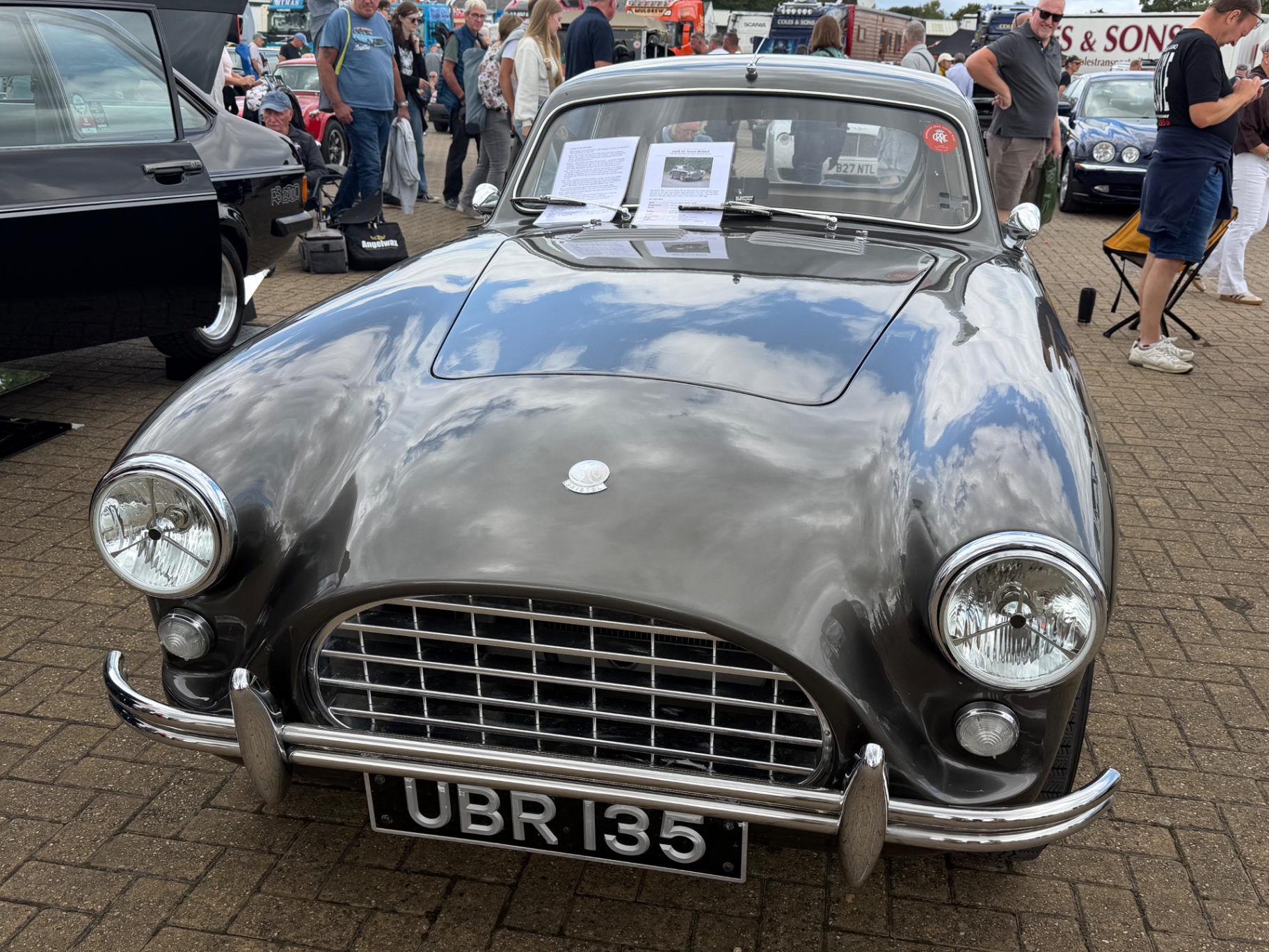Head-on view of AC Aceca-Bristol UBR 135 with its display card on the windscreen