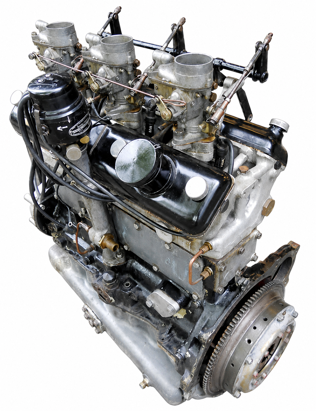 Bristol two-litre six engine removed from car showing the three Solex carburettors on their flanges with visible throttle linkage