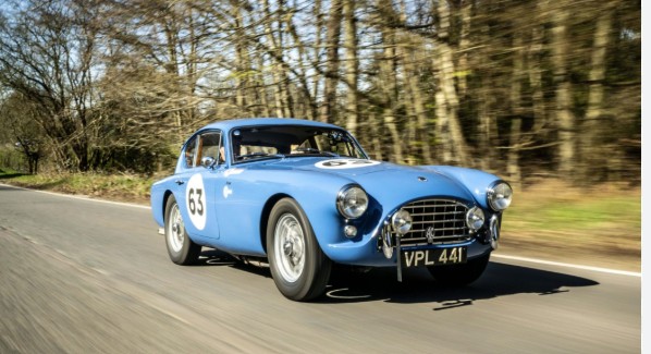 Donald Campbell's Bluebird AC Aceca prototype VPL 441 on a country road, finished in Bluebird blue and wearing racing number 63