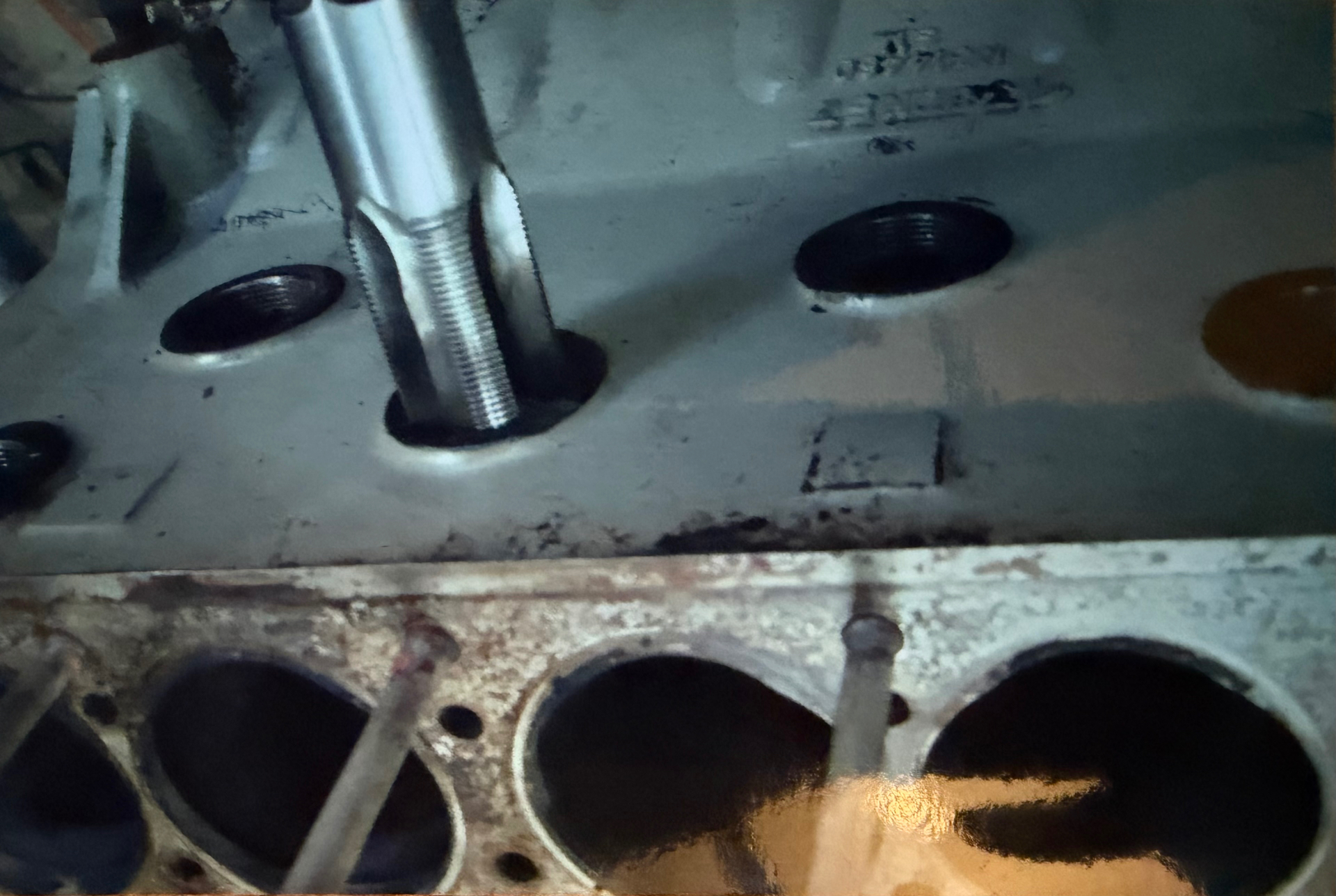 Side view of a machined Bristol six cylinder block, showing the head-stud face and the tops of the bores