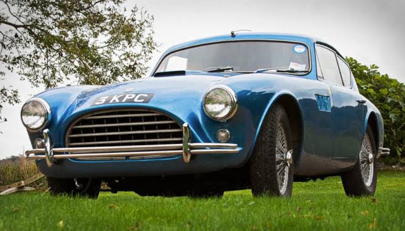 Blue AC Aceca prototype registered 3 KPC, front three-quarter view on grass