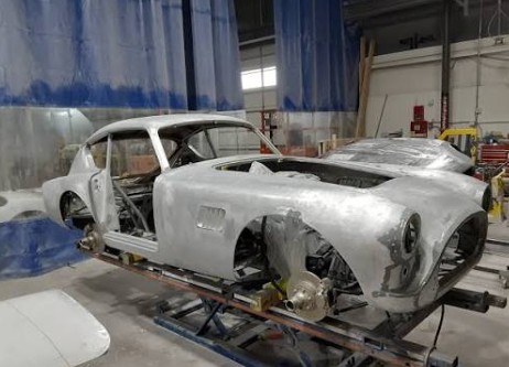 AC Aceca body shell undergoing mechanical restoration in a specialist workshop